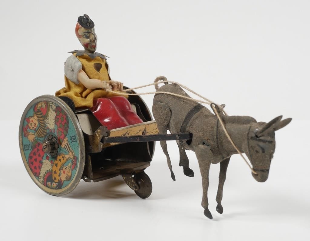 LEHMANN CLOWN CART TIN WINDUP TOYThis