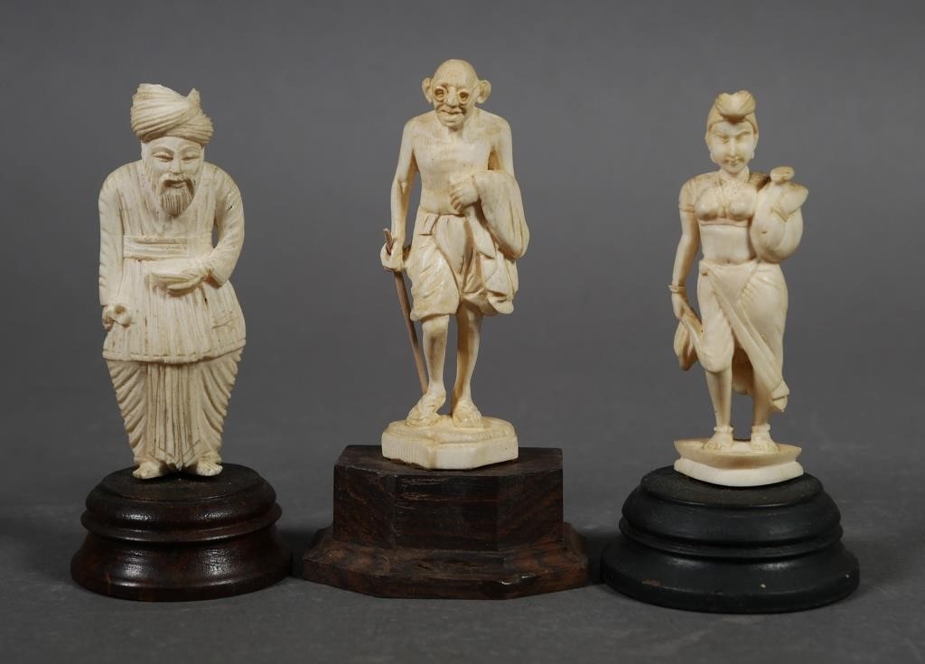 3 CARVED IVORY FIGURES INCL GANDHIThree 365bcf