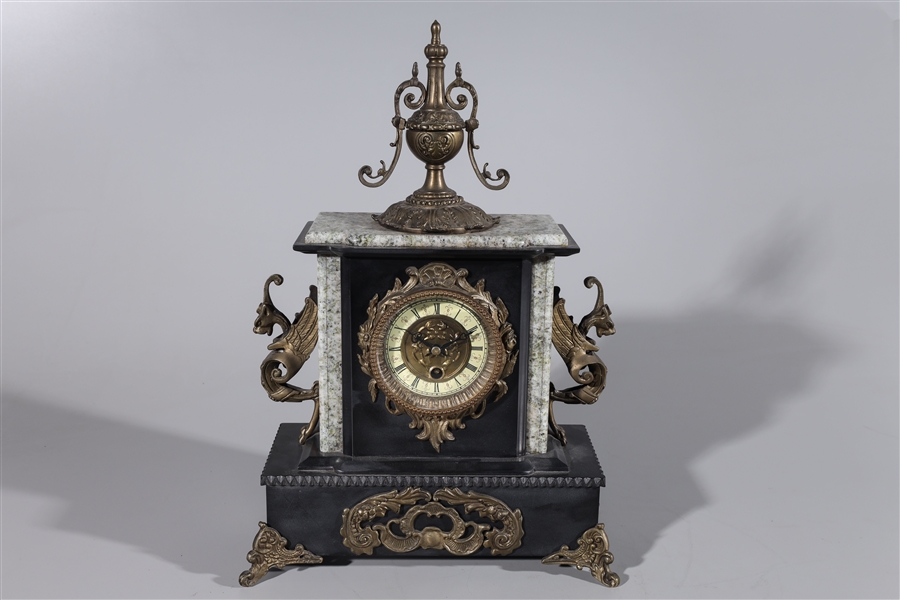 Metal and stone mantle clock with elaborate