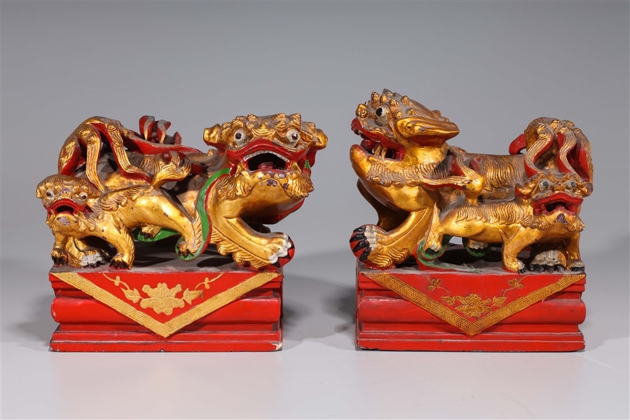 Pair of Chinese gilt lacquer carved 369128