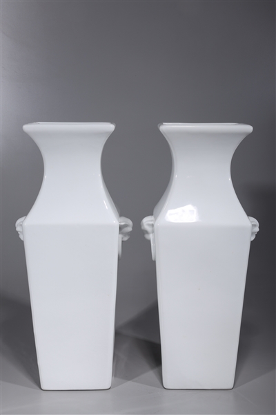 Pair of tall white glazed Chinese