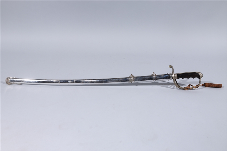 Sword with metal scabbard and cloth