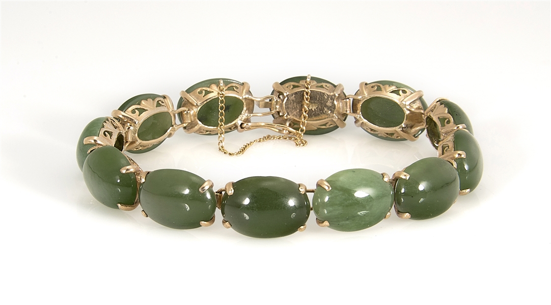 Chinese carved spinach jade cabochons,