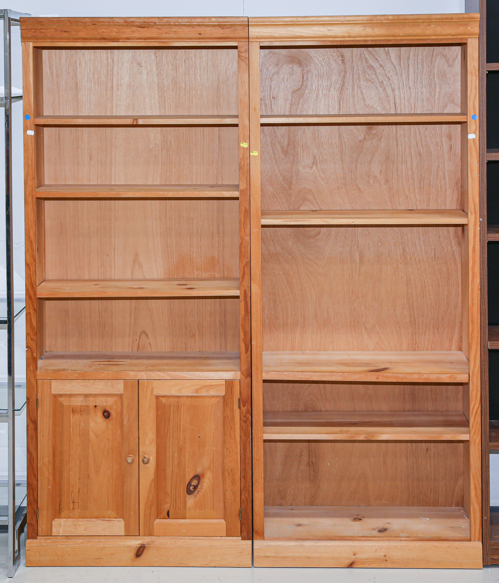 TWO VERNACULAR STYLE PINE BOOKCASES