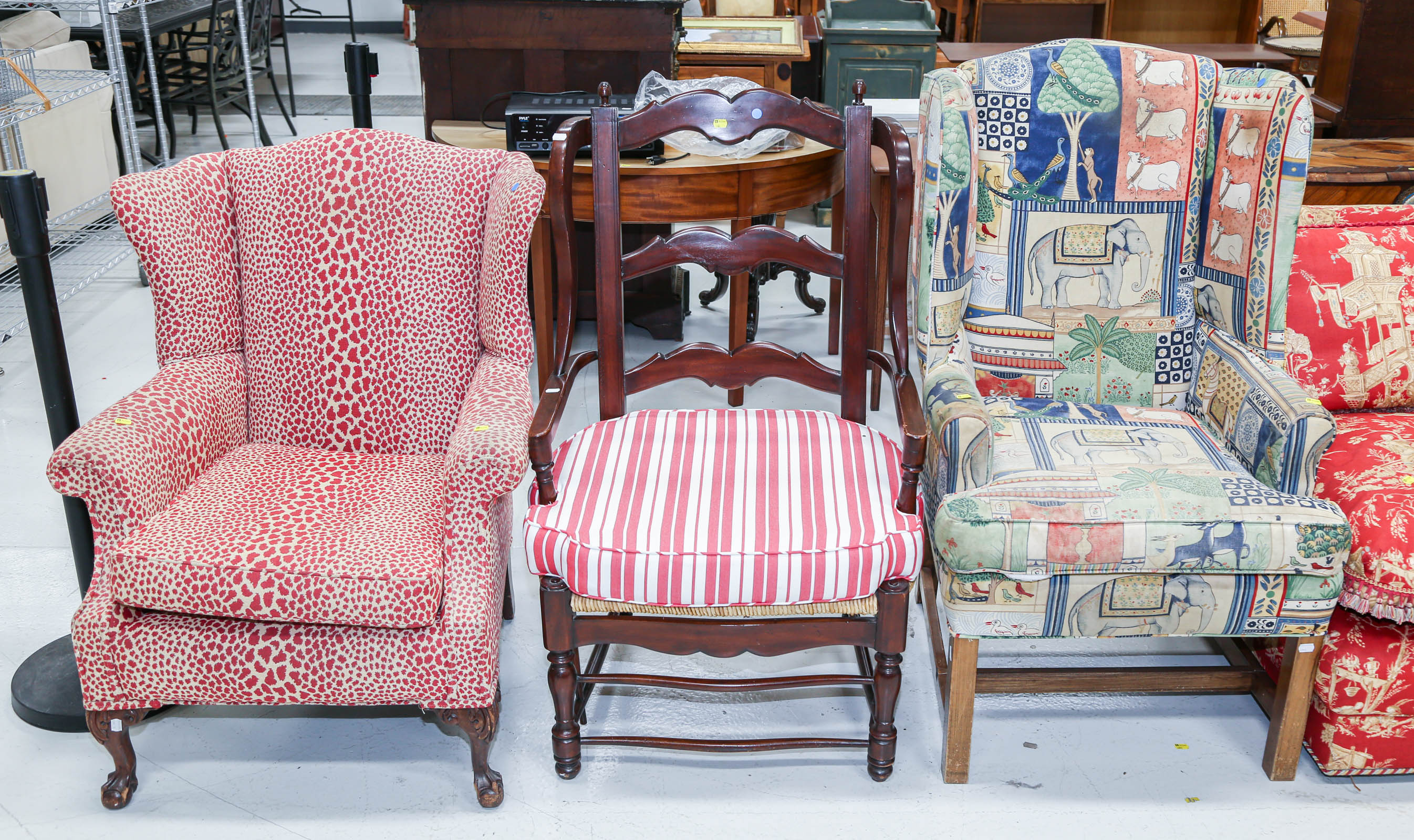 THREE WINGBACK ARMCHAIRS Including