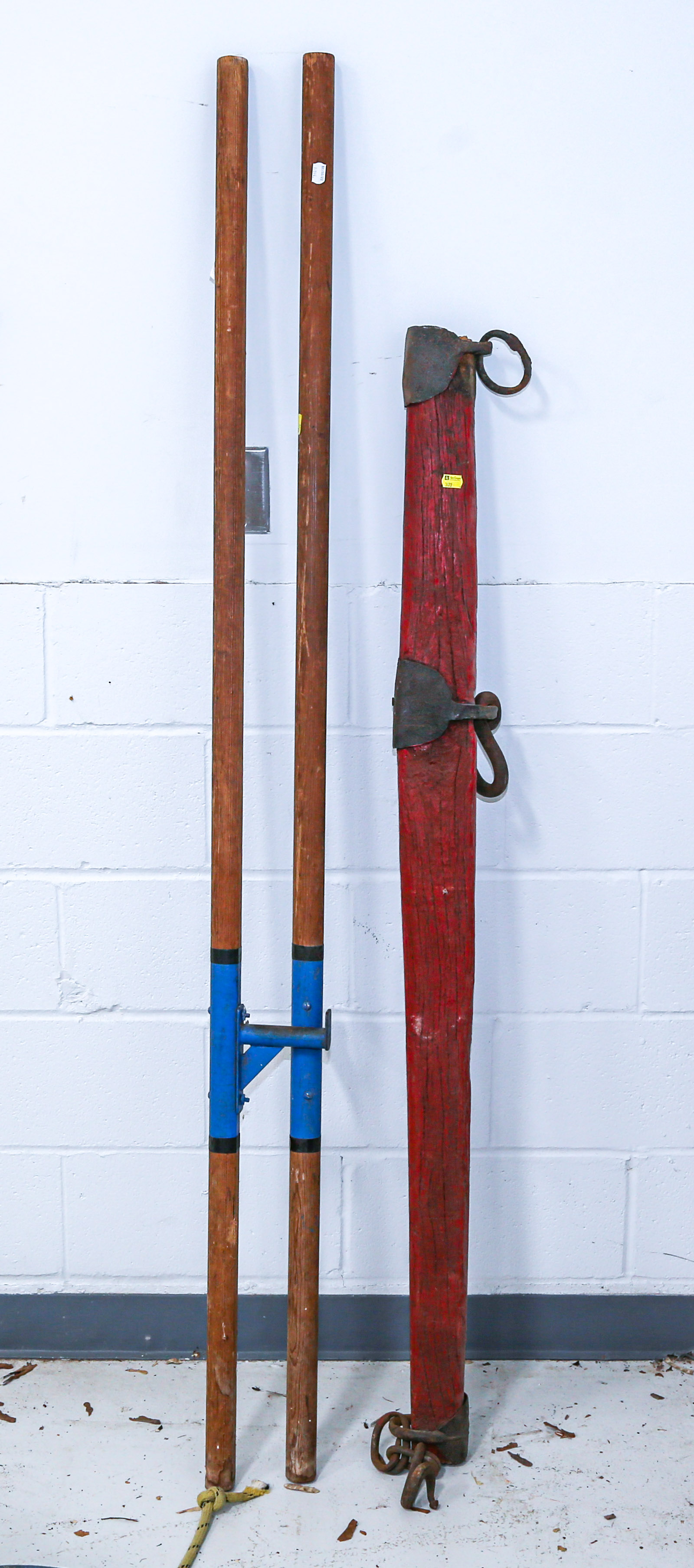 A PAIR OF WOODEN STILTS & OXEN YOKE