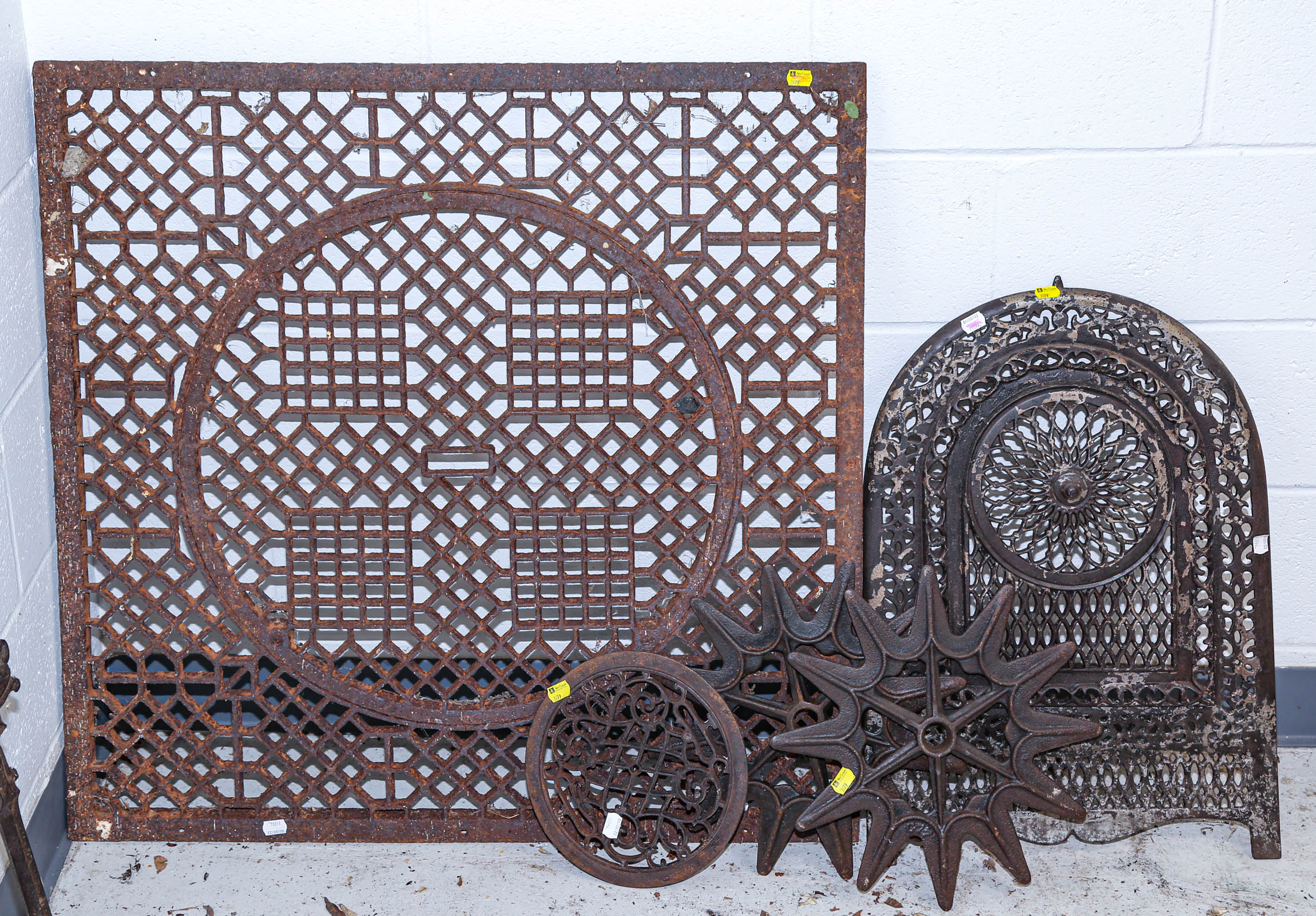 THREE CAST IRON REGISTER GRATES