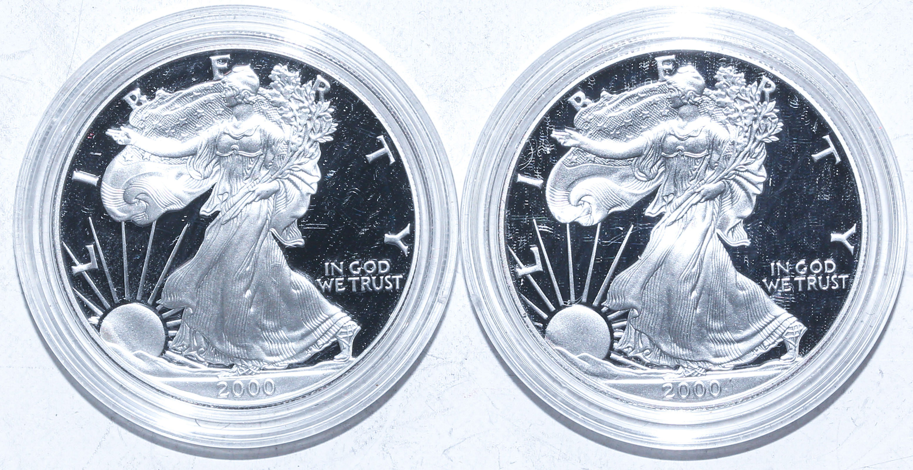 A PAIR OF 2000 PROOF SILVER EAGLES 369b53