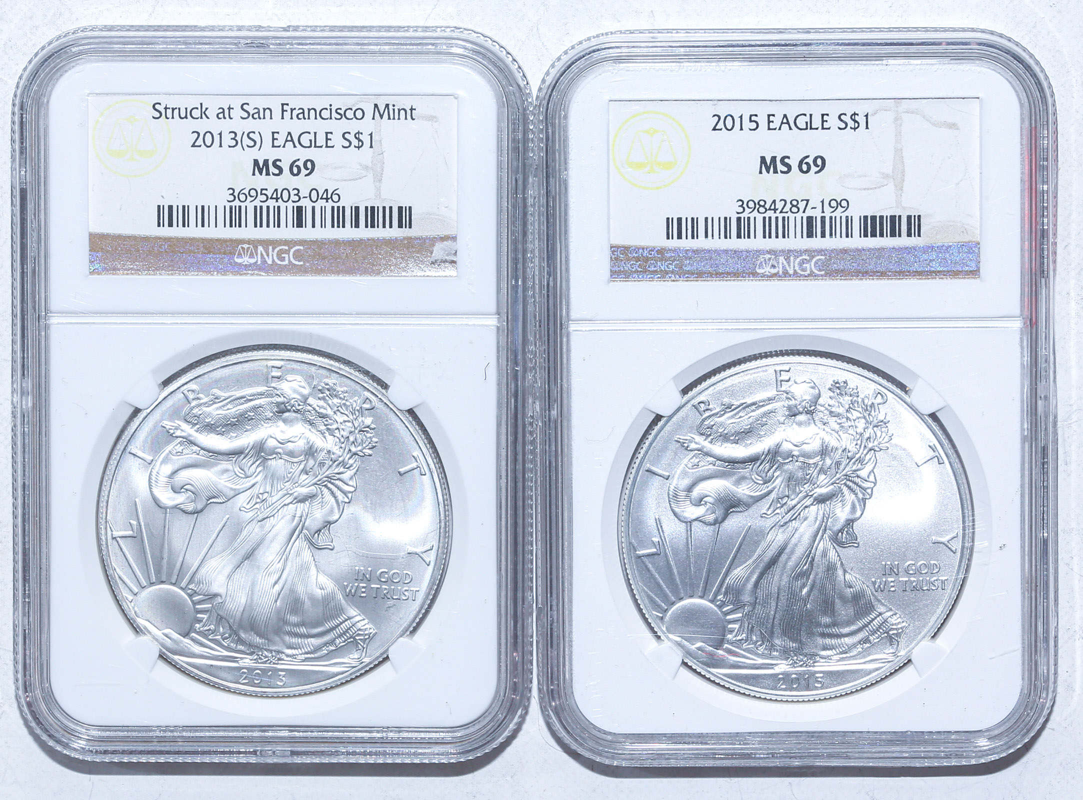 A PAIR OF NGC MS69 SILVER EAGLES, 2013-S