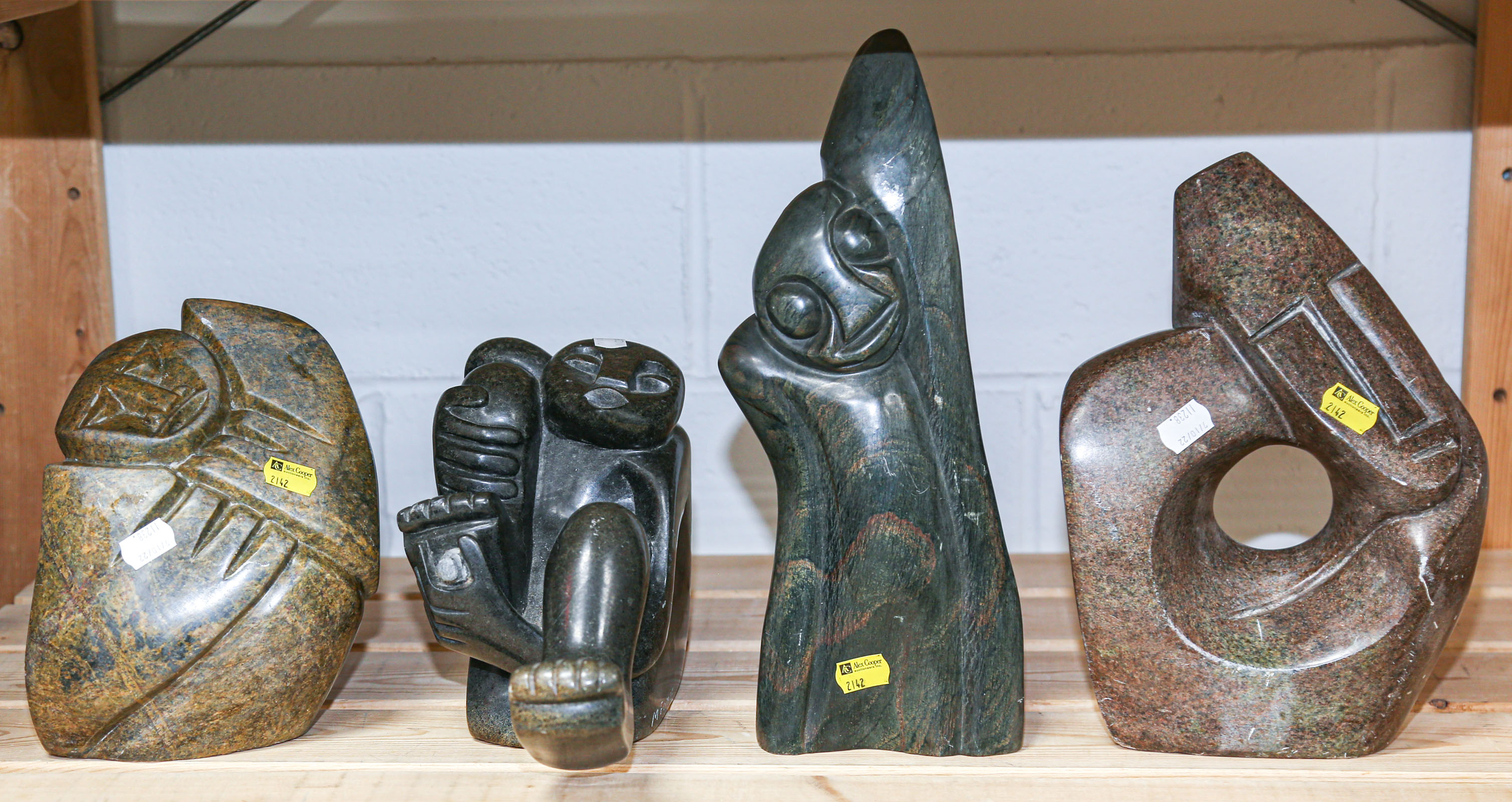 FOUR ABSTRACT SHONA SOAPSTONE SCULPTURES
