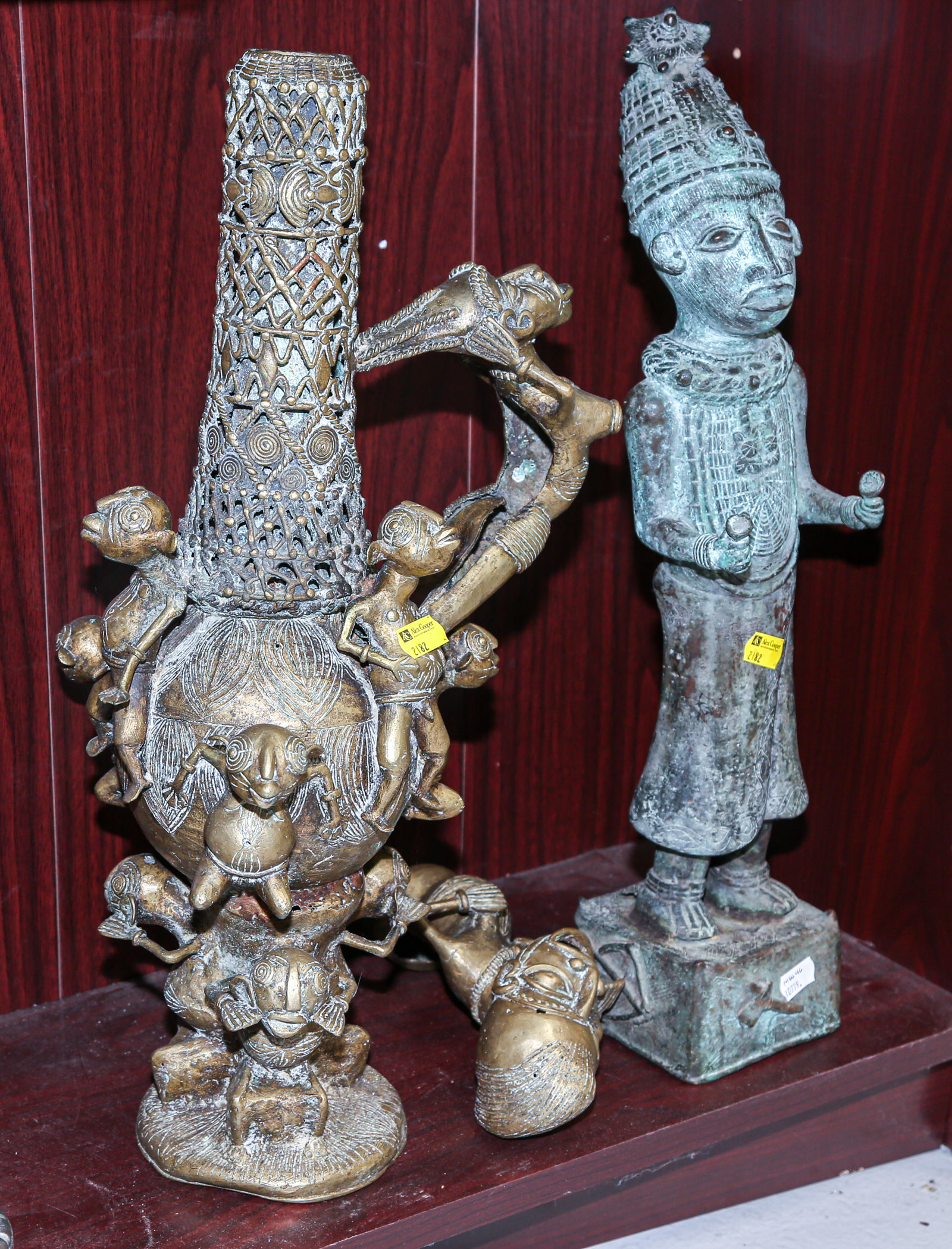 TWO AFRICAN BRASS SCULPTURES Includes