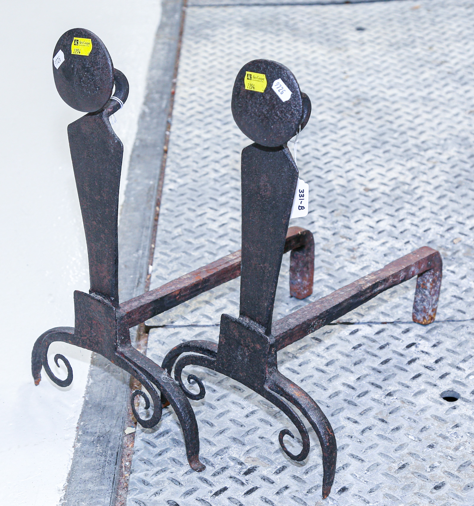 A PAIR OF ANTIQUE WROUGHT IRON