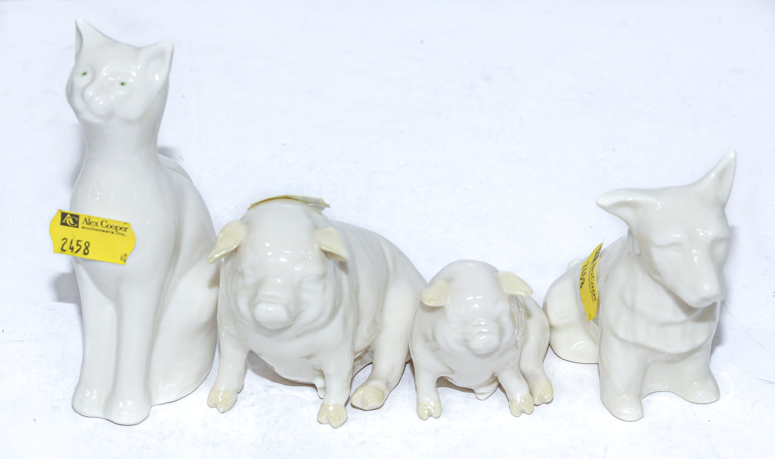 FOUR BELLEEK ANIMAL FIGURES Comprising