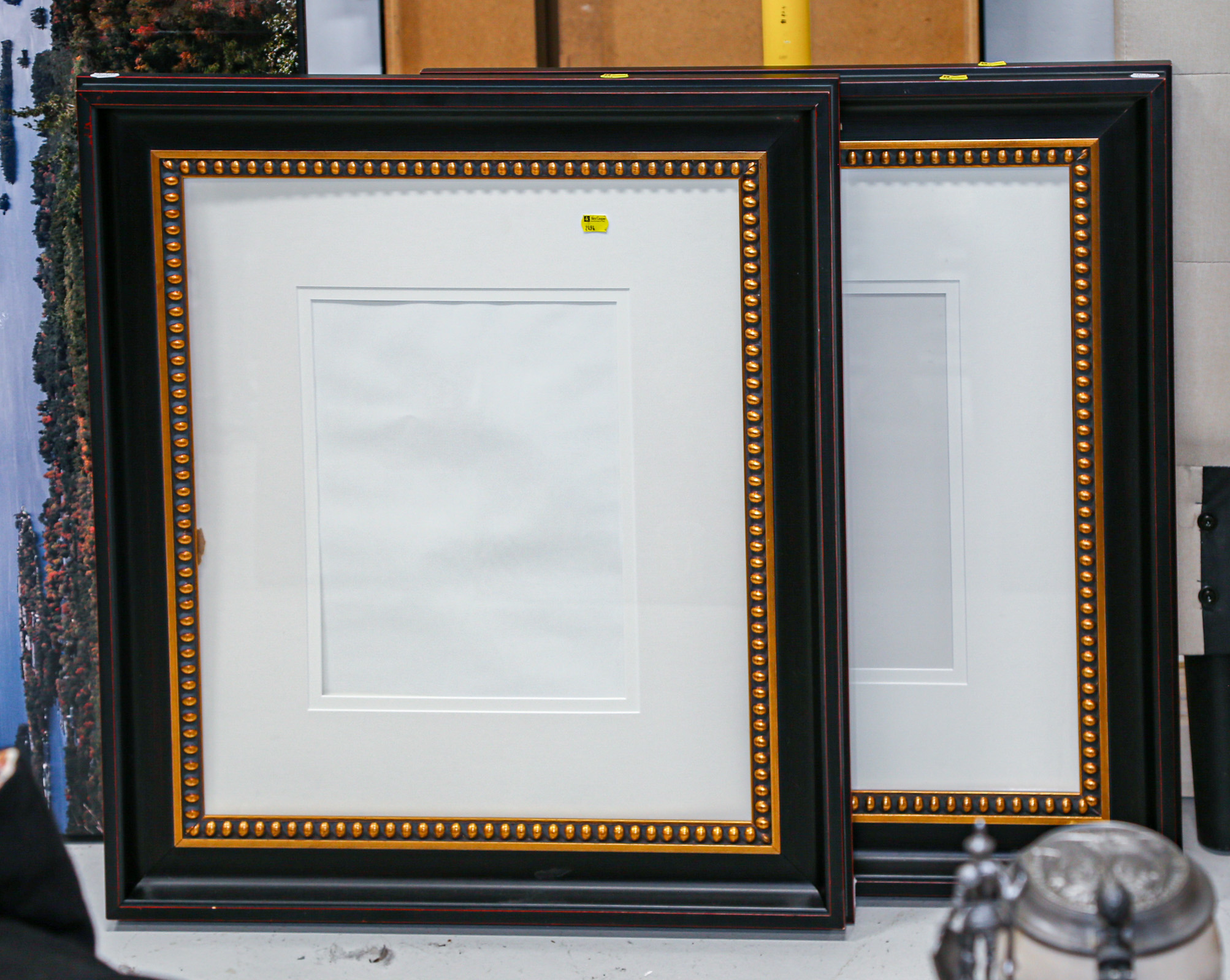 A PAIR OF CONTEMPORARY FRAMES 31 1/2