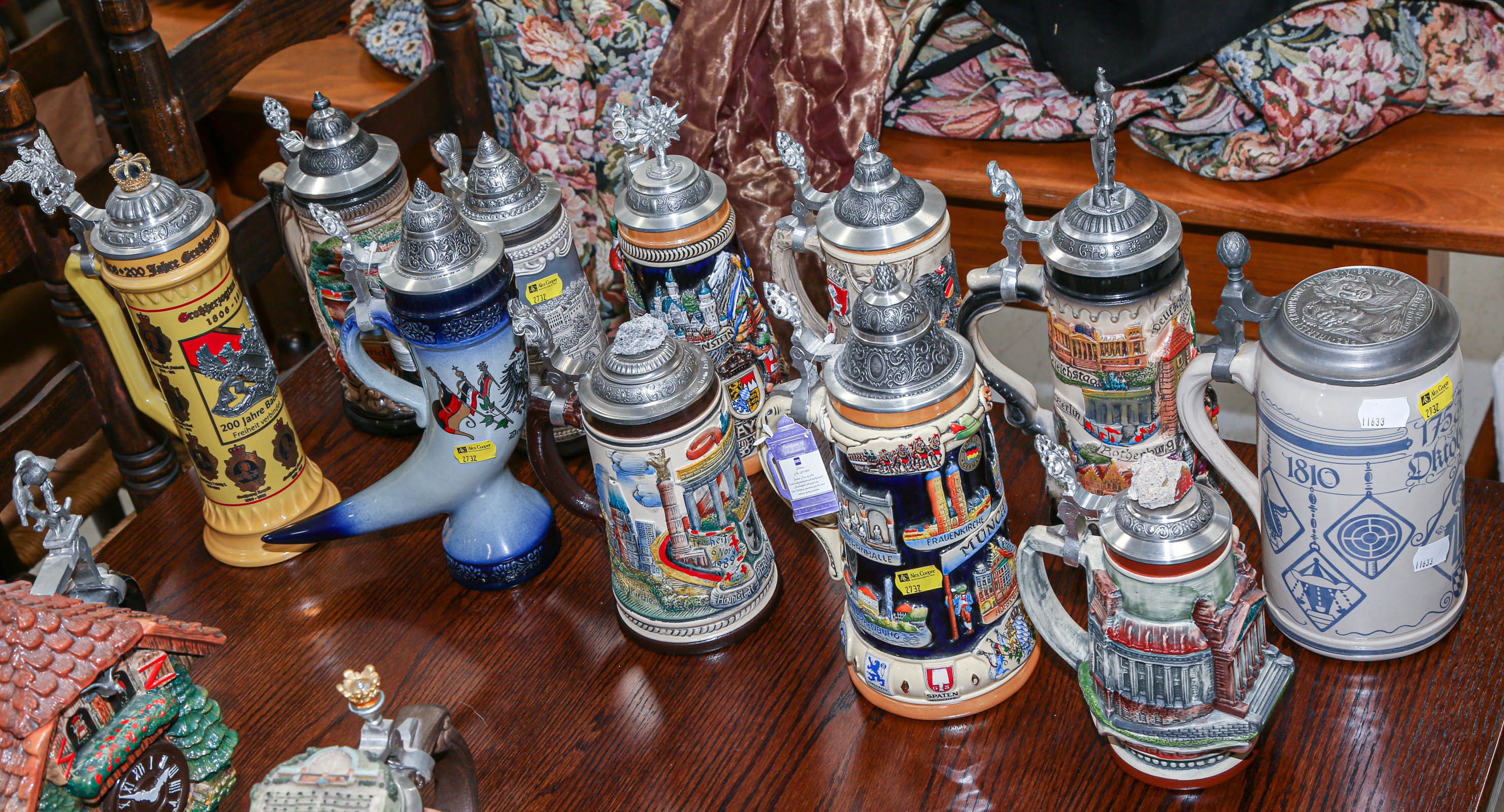 ASSORTMENT OF GERMAN BEER STEINS Many