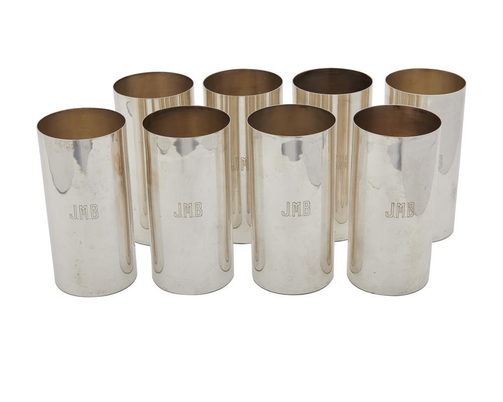 SET OF EIGHT CARTIER SILVER CYLINDRICAL