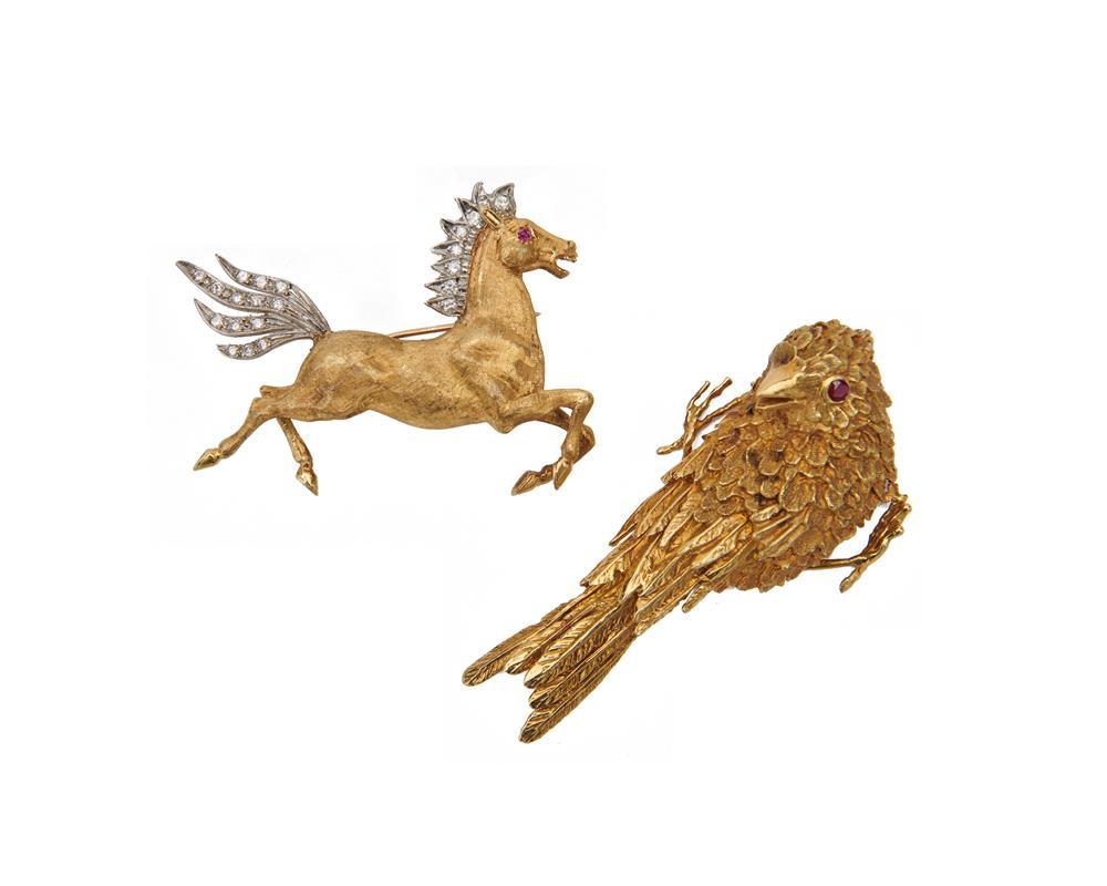 TWO GOLD AND GEMSET FIGURAL BROOCHESTwo