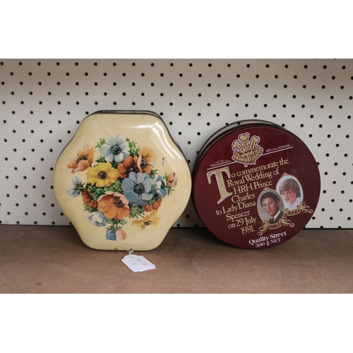 Two tins containing vintage embroidery