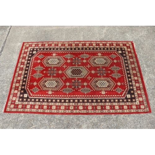 Handwoven carpet of red ground, approx