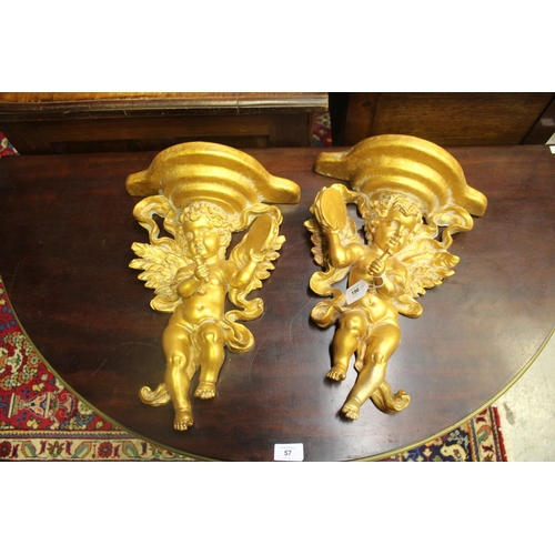 Pair of decorative gilt cherub