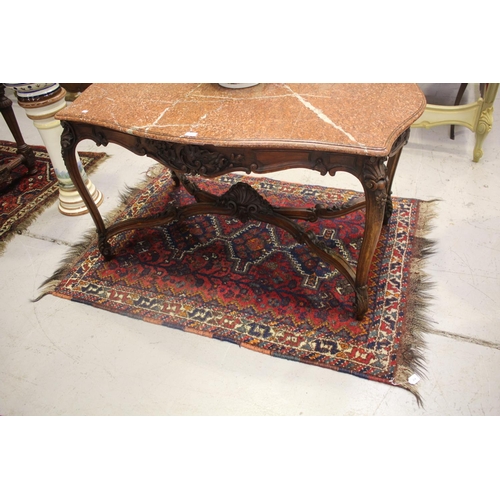 Tribal hand knotted wool carpet, of