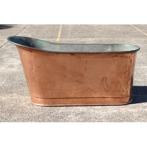 Antique French copper bathtub of slipper