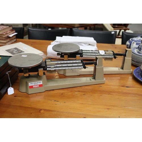 Two sets of vintage weighing scales,
