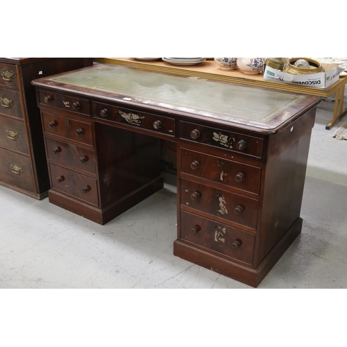 Twin pedestal desk with tooled leather