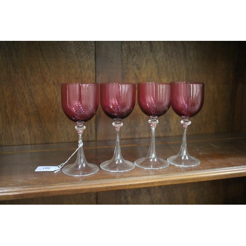Set of four ruby twist design glasses,