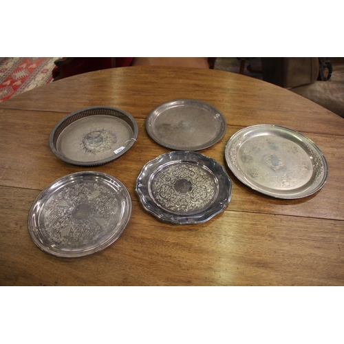Five silver plated circular trays, approx