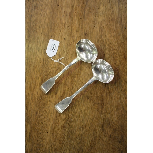 Pair of sterling silver sauce ladles,