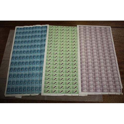 Three sheets of unused New Zealand stamps,