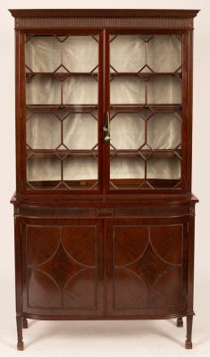 A reproduction mahogany bookcase,