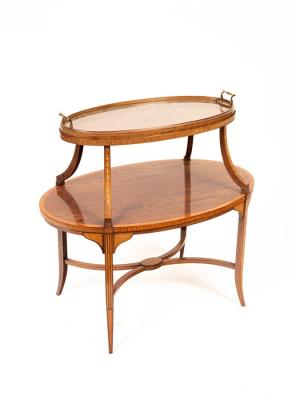 An Edwardian mahogany two tier 36b023