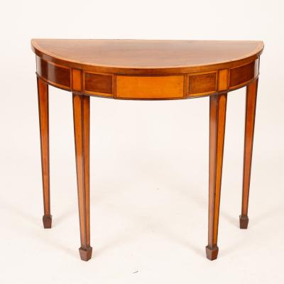 A mahogany half-round hall table, banded