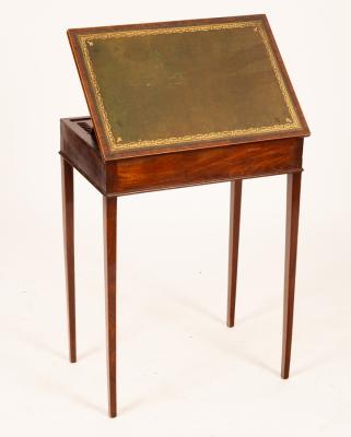 A George IV mahogany reading table,
