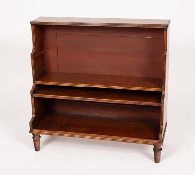 A mahogany waterfall bookcase,