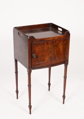 A mahogany tray top bedside cupboard,