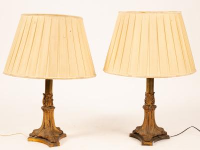 A pair of gilt brass table lamps