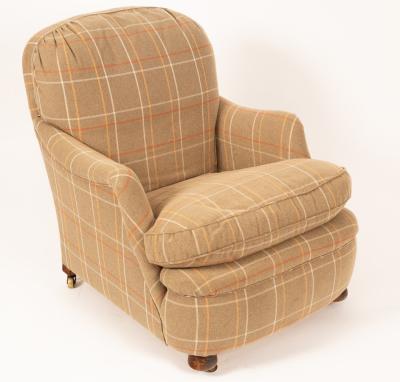 An early 20th Century armchair upholstered