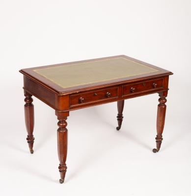 A Victorian writing table, the