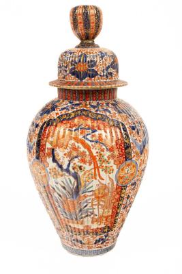 A Japanese Arita vase and cover of ribbed