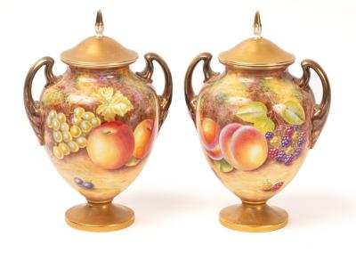 A pair of Royal Worcester two-handled