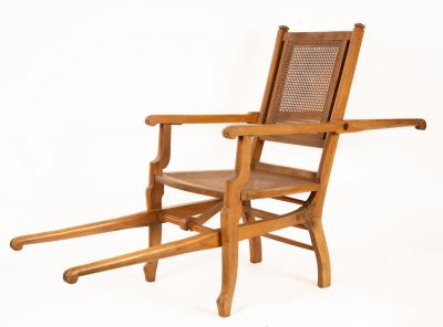 A folding beech carrying chair by Dupont