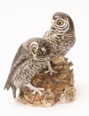 A large Meissen group of two owls naturalistically