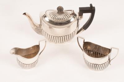 An Edwardian three piece silver tea