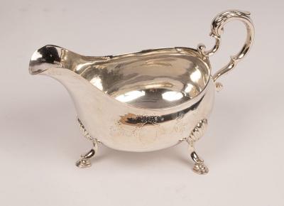 A George III silver sauce boat,