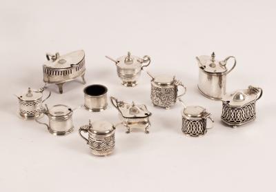 Eleven assorted silver mustard pots,