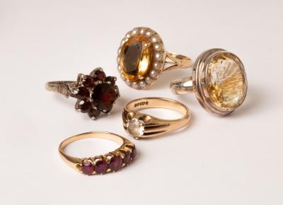 A ruby five-stone ring, the row of graduated