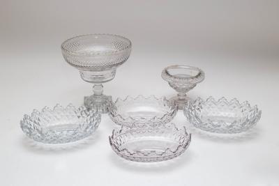 A circular cut glass footed bowl